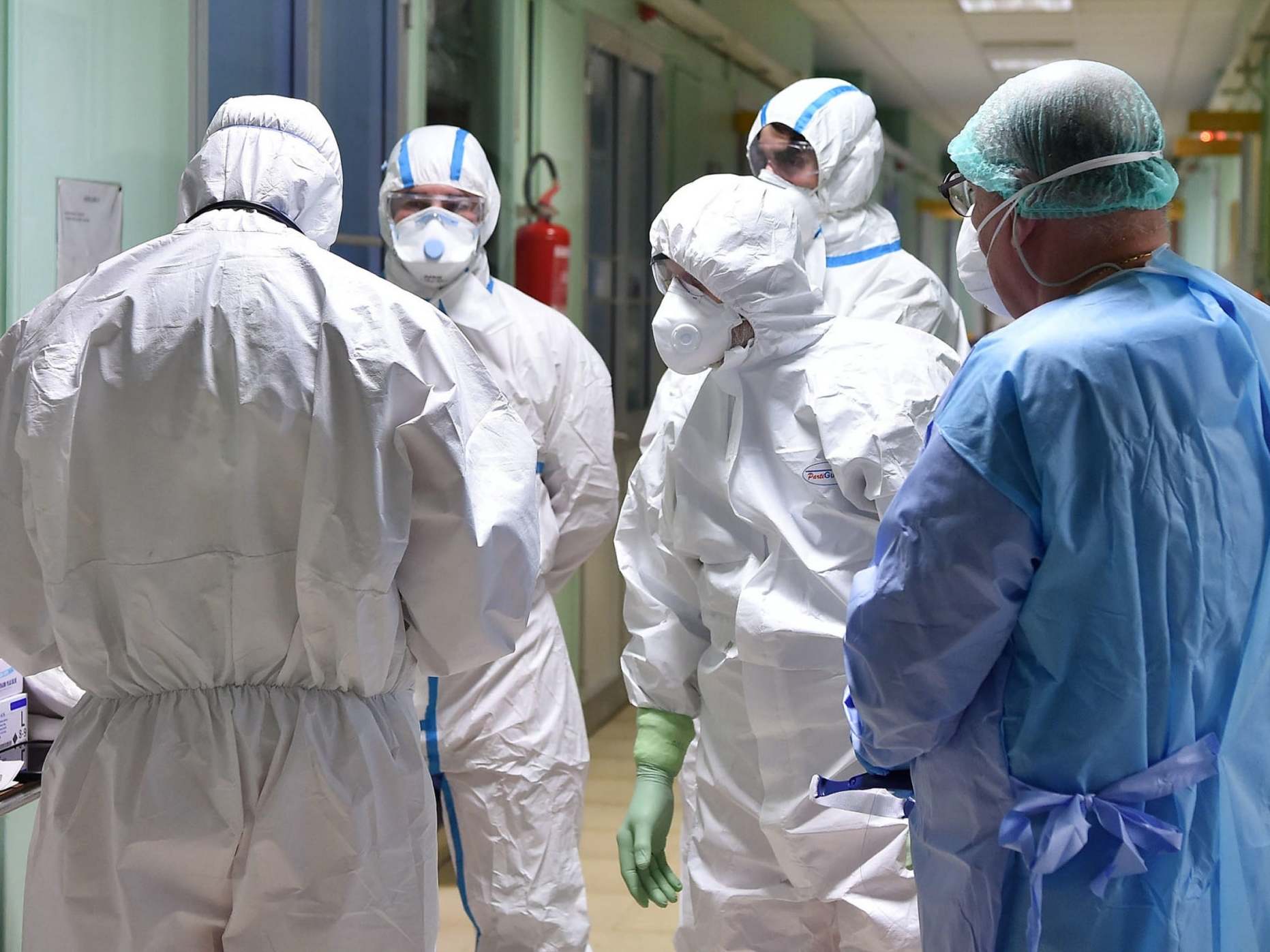 What's the difference between isolation gown and coveralls?